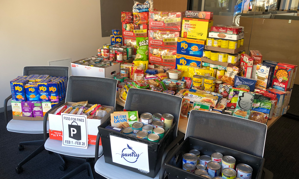 A stack of food items in a room.